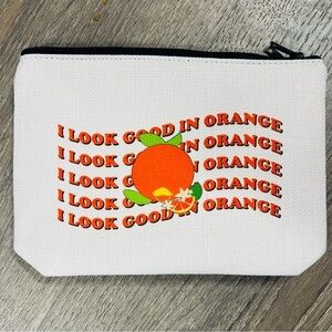 Victoria Leland Design White Pouch with Orange Graphic